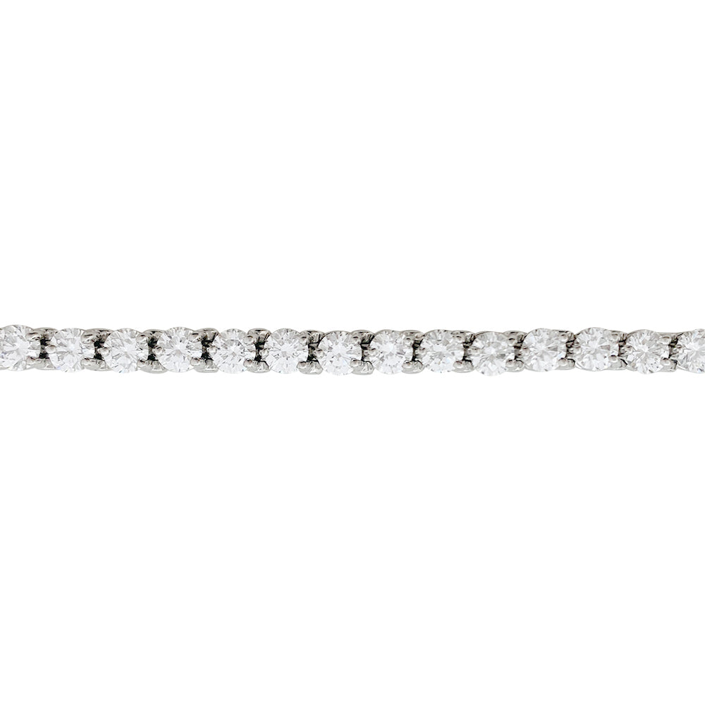 Cartier, "Lignes Essentielles" bracelet, in platinum set with diamonds.