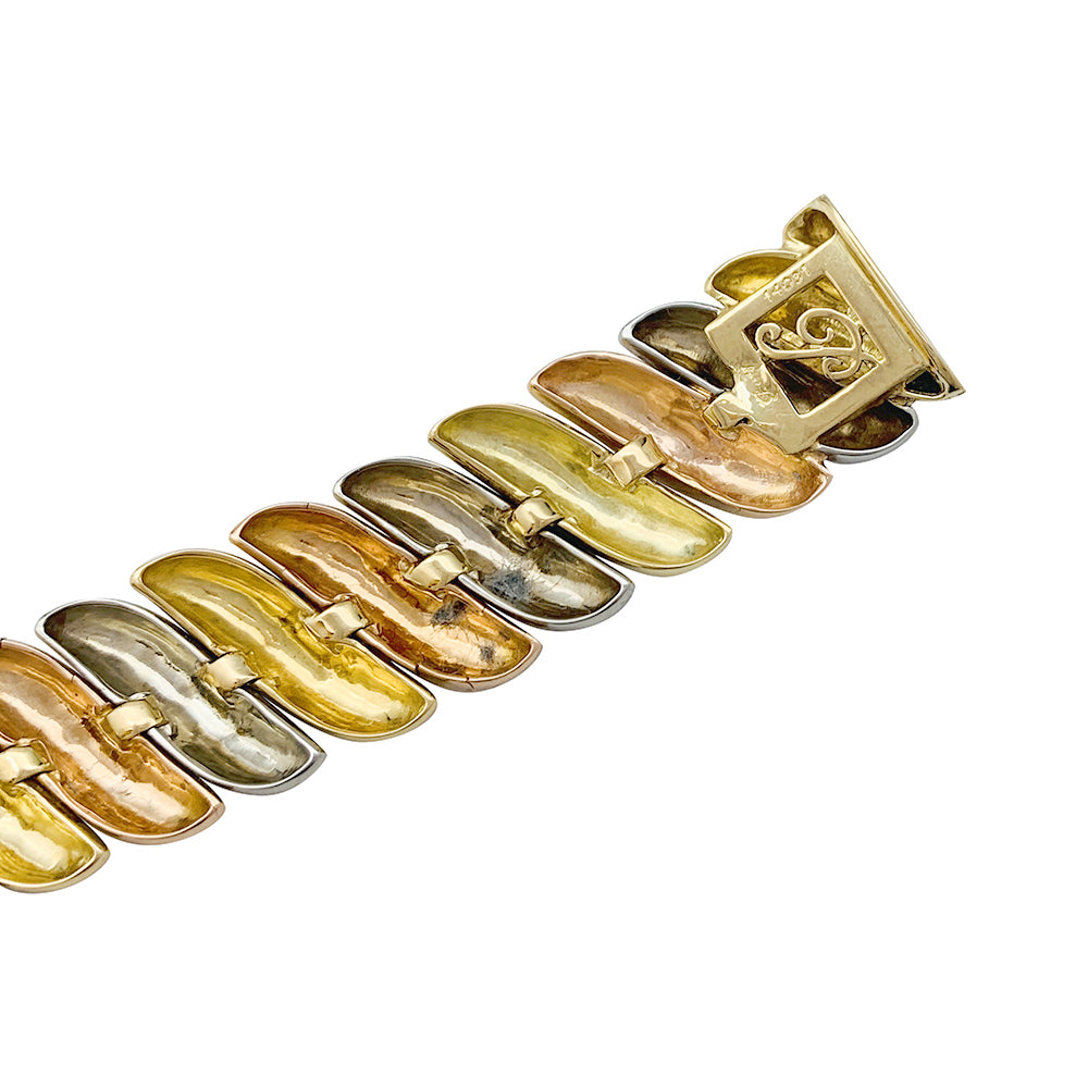 Poiray bracelet in three shades of gold.