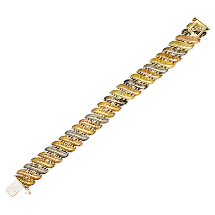 Bracelet Poiray en trois tons d'or.