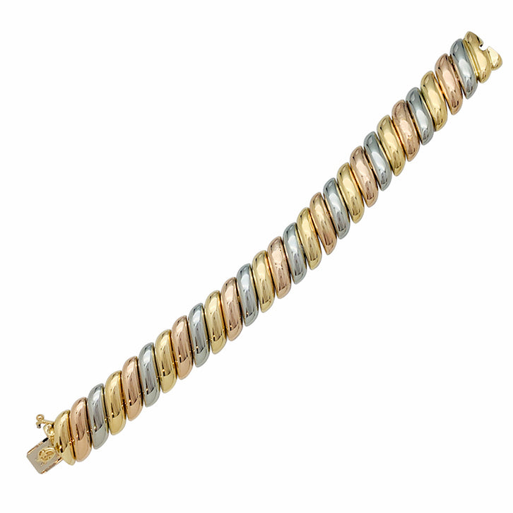 Poiray bracelet in three shades of gold.