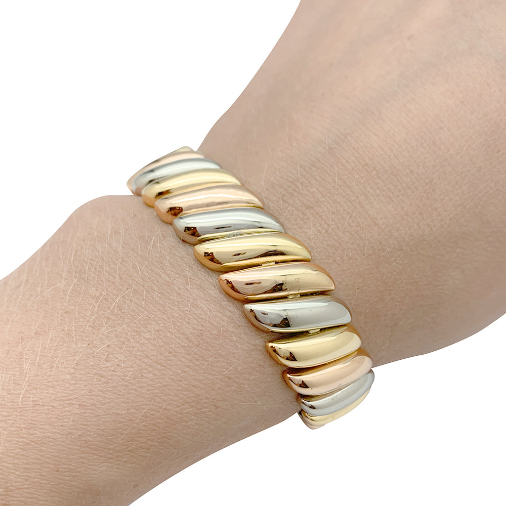 Poiray bracelet in three shades of gold.