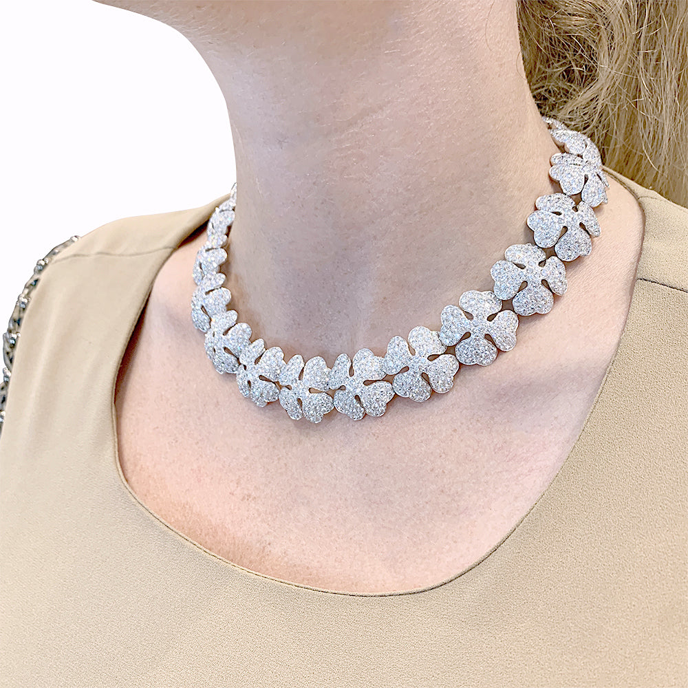 Cartier "Clover" necklace in white gold and diamonds.