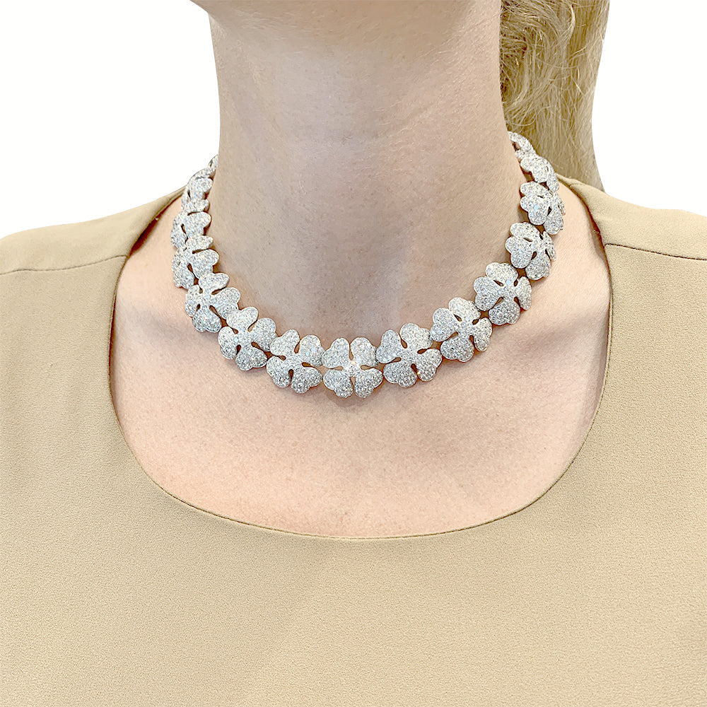 Cartier "Clover" necklace in white gold and diamonds.