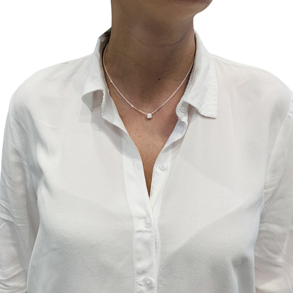 Cartier solitaire necklace, 0.85 carat diamond in white gold.