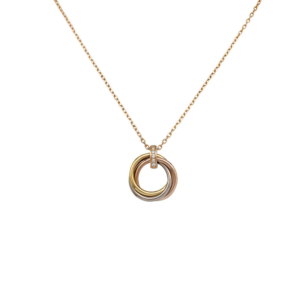 Cartier necklace, "Trinity", three golds, diamonds.