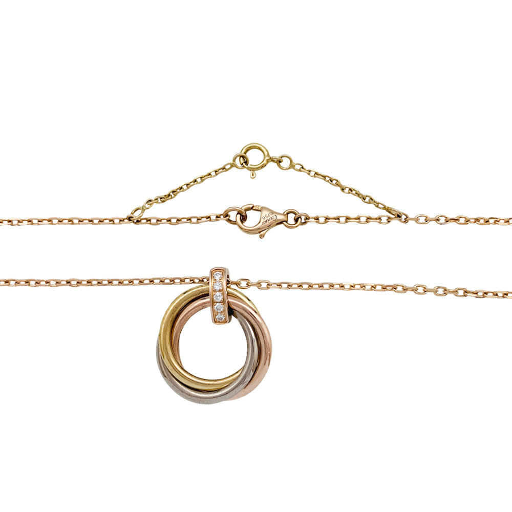 Cartier necklace, "Trinity", three golds, diamonds.