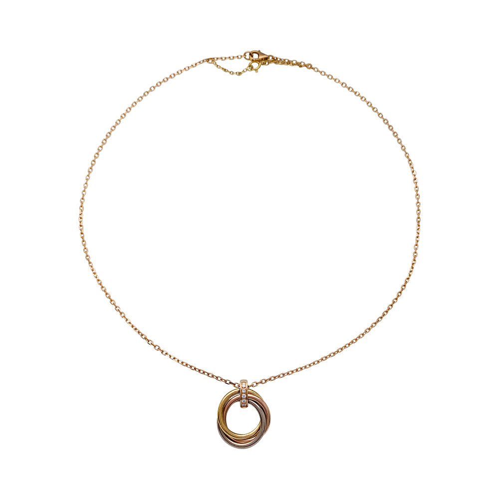 Cartier necklace, "Trinity", three golds, diamonds.