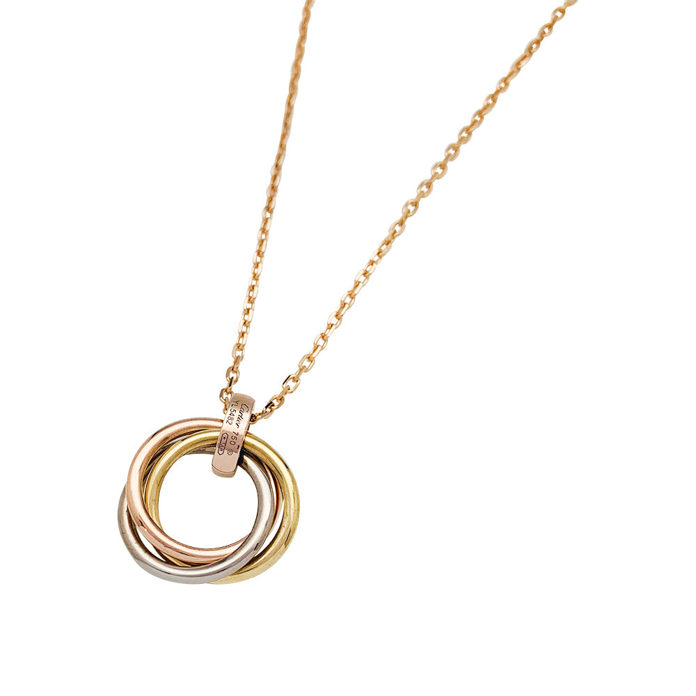 Cartier necklace, "Trinity", three golds, diamonds.