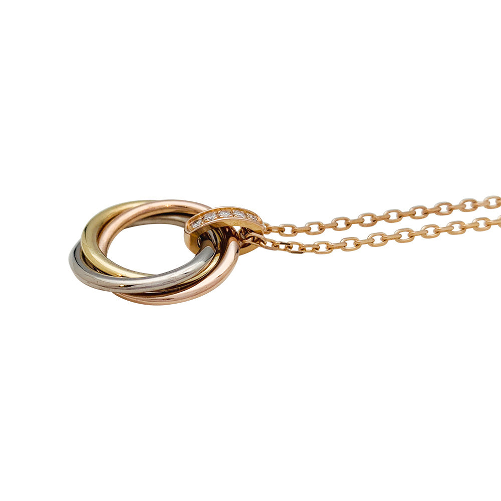 Cartier necklace, "Trinity", three golds, diamonds.
