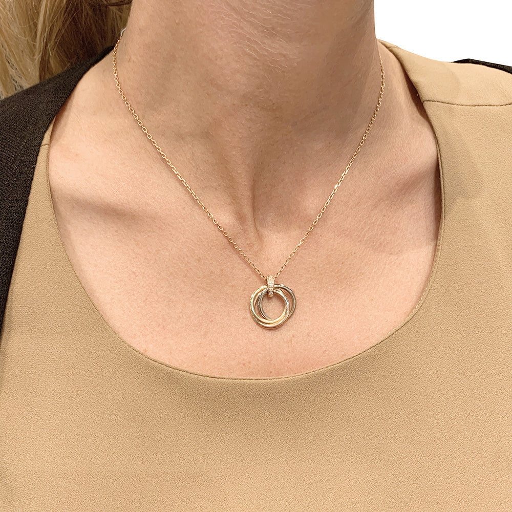 Cartier necklace, "Trinity", three golds, diamonds.