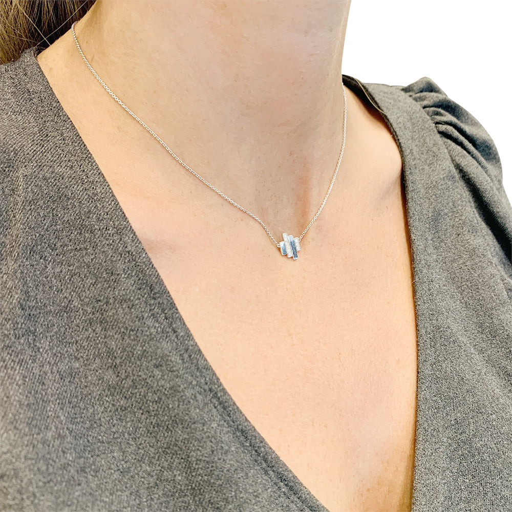 Dinh Van "Cadence" necklace in white gold, diamonds.