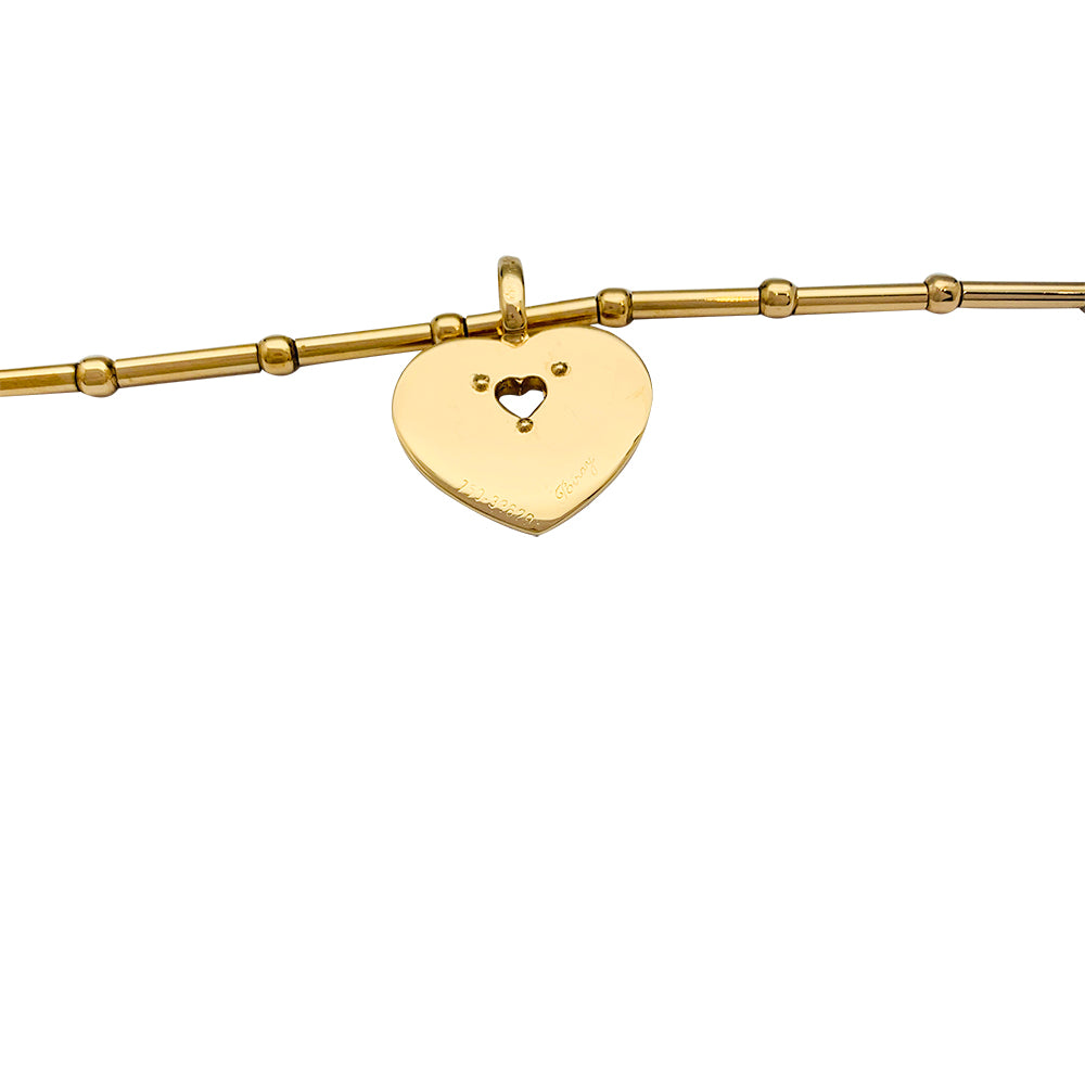 Poiray "Coeur Secret" necklace in yellow gold, diamonds.