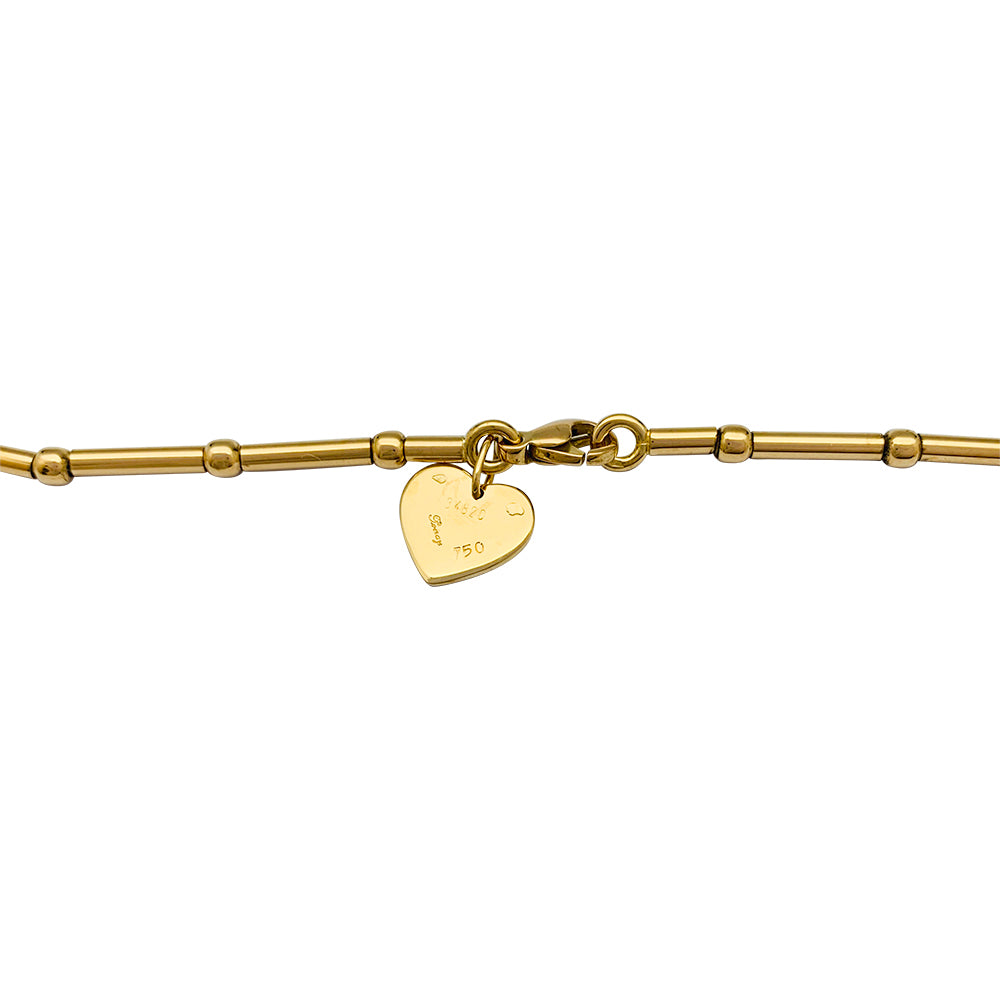 Poiray "Coeur Secret" necklace in yellow gold, diamonds.