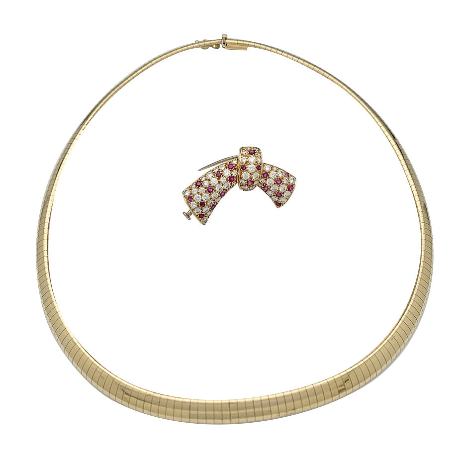 Van Cleef & Arpels transformable necklace, yellow gold, rubies, diamonds.