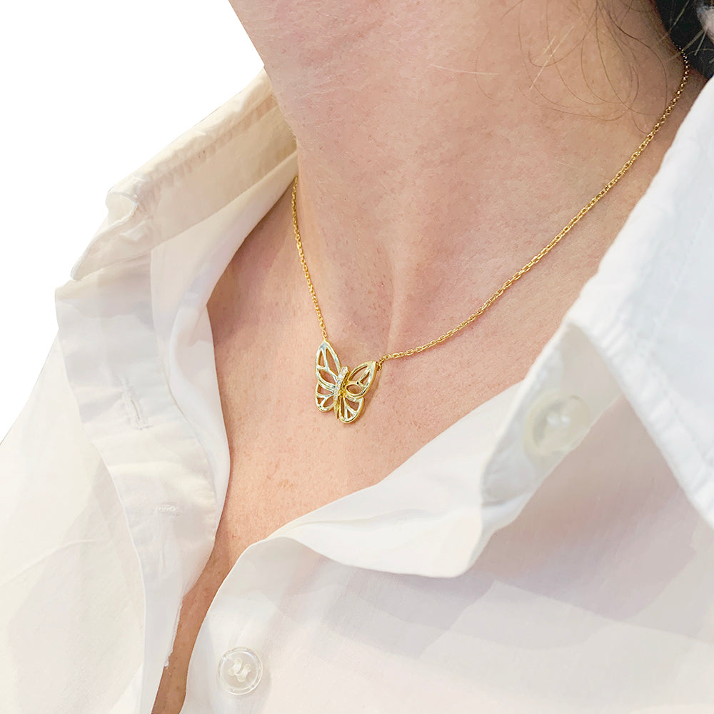 Van Cleef & Arpels "Butterfly" necklace in yellow gold and diamonds.