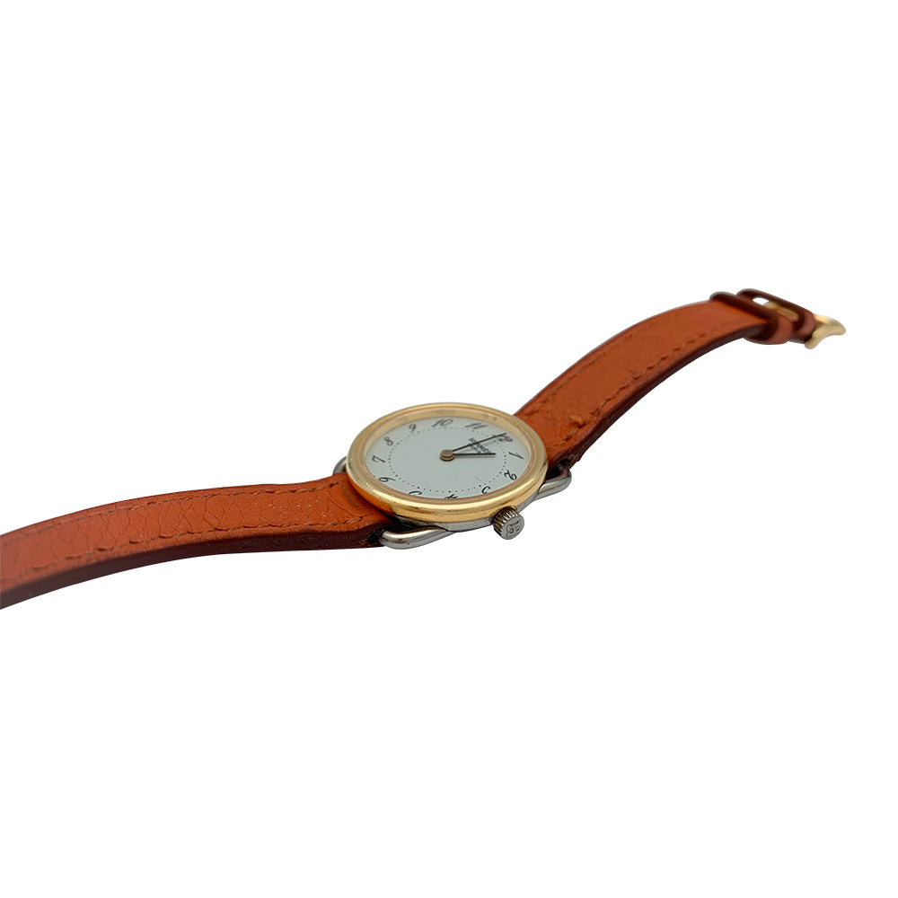 Hermès watch, "Arceau", gold plated and steel on leather.