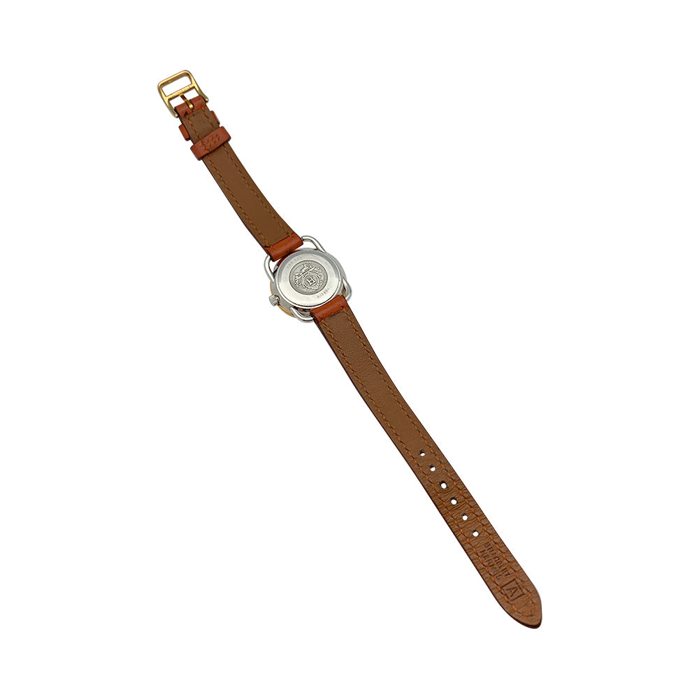 Montre Hermès, "Arceau", plaqué or et acier sur cuir.