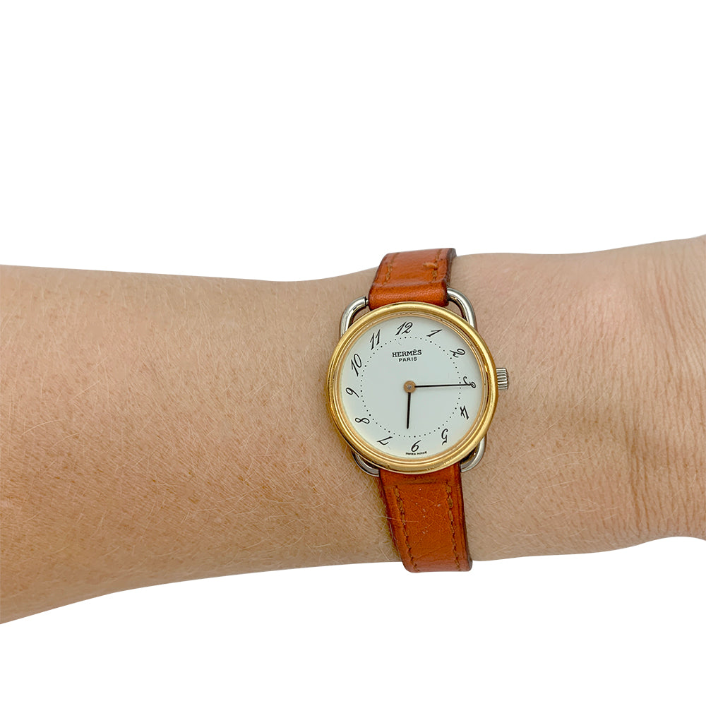 Hermès watch, "Arceau", gold plated and steel on leather.