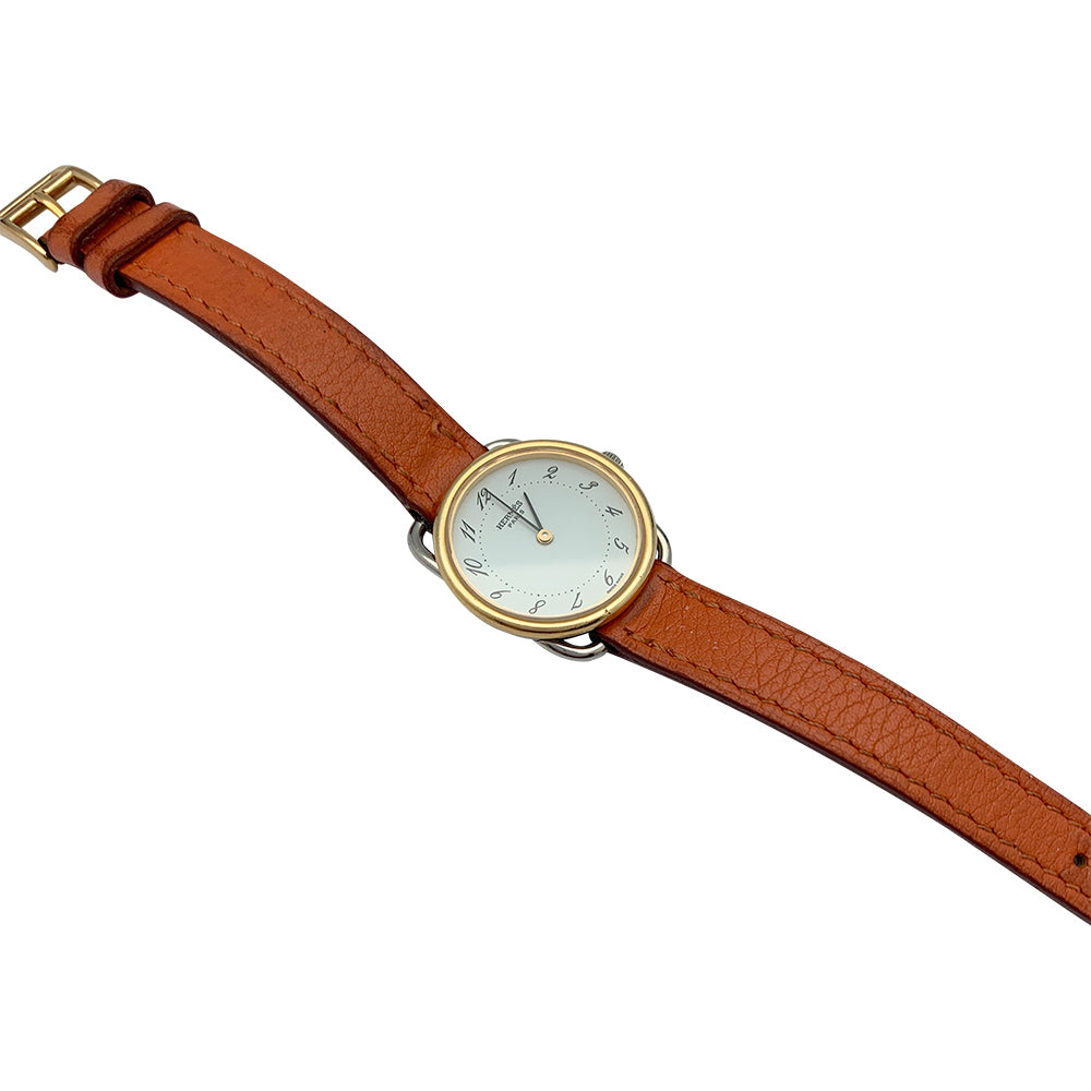 Hermès watch, "Arceau", gold plated and steel on leather.
