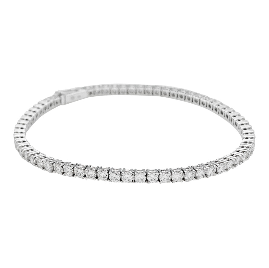 Ligne tennis Gubelin or blanc diamants.