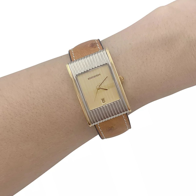 Boucheron watch, "Reflet", yellow gold, steel.