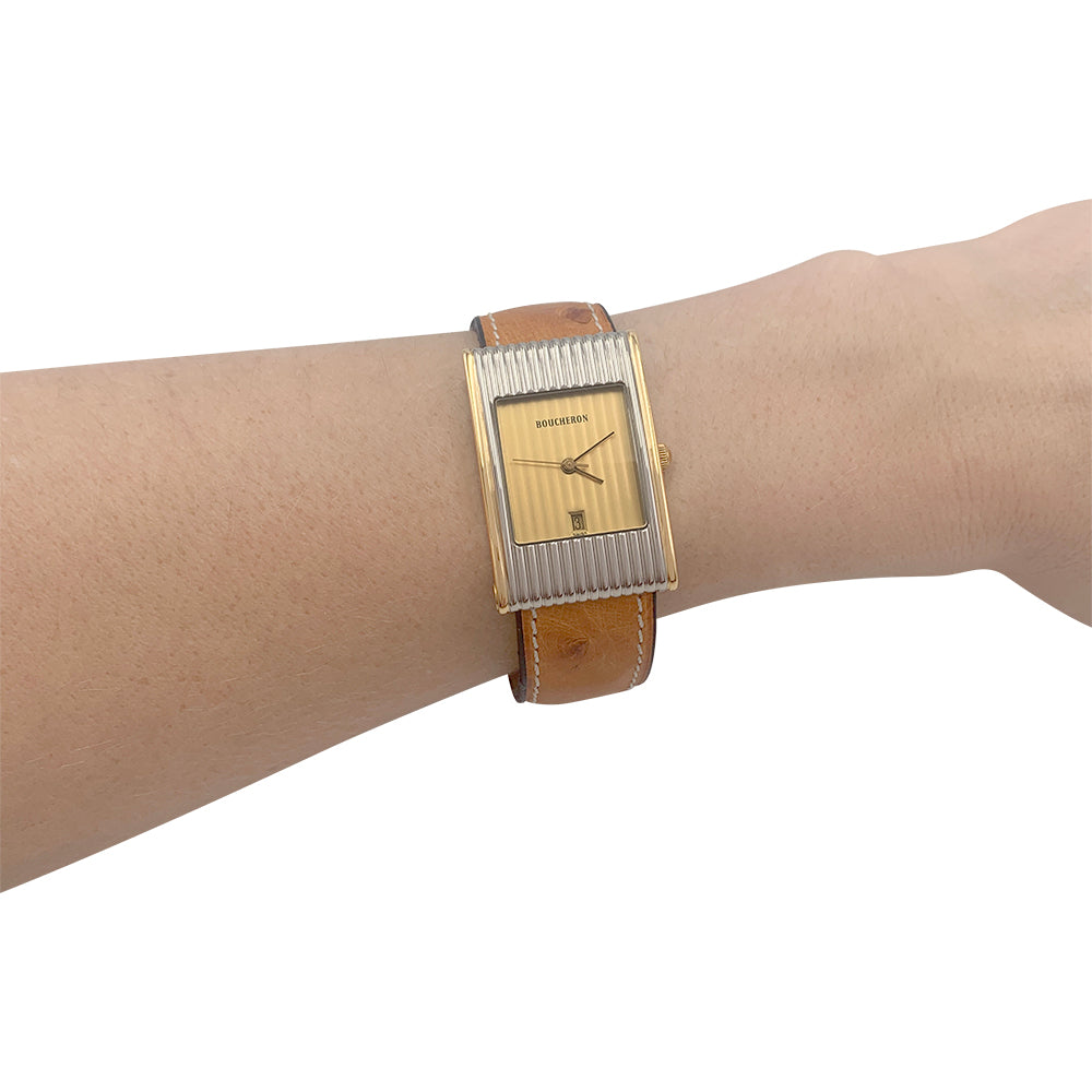 Boucheron watch, "Reflet", yellow gold, steel.