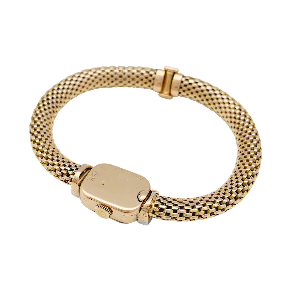 Boucheron watch in rose gold and diamonds.