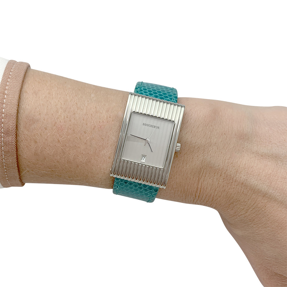 Boucheron watch, "Reflet" model, in steel on leather.