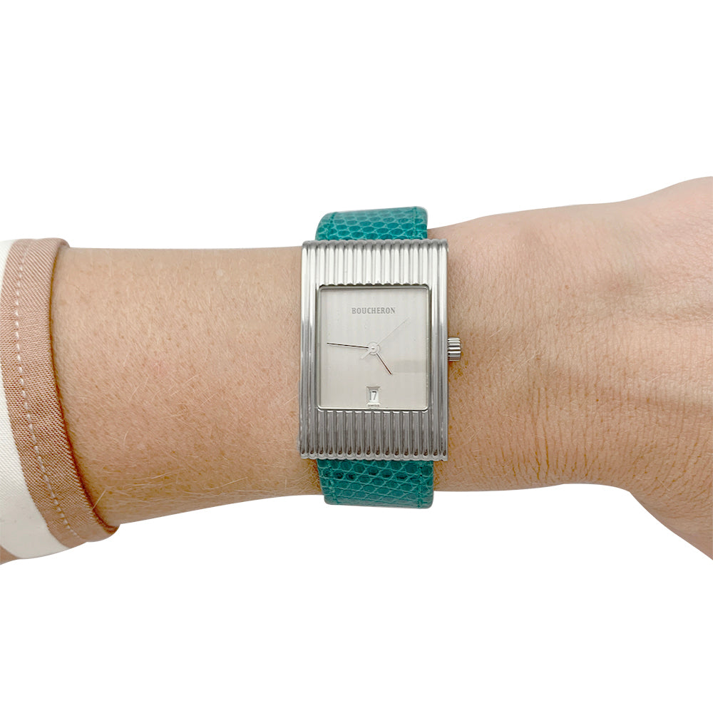 Boucheron watch, "Reflet" model, in steel on leather.