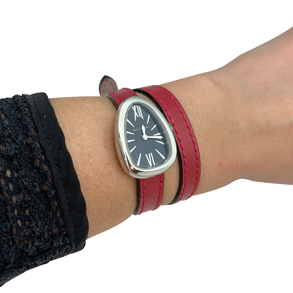 Bulgari "Serpenti" watch in steel and leather.