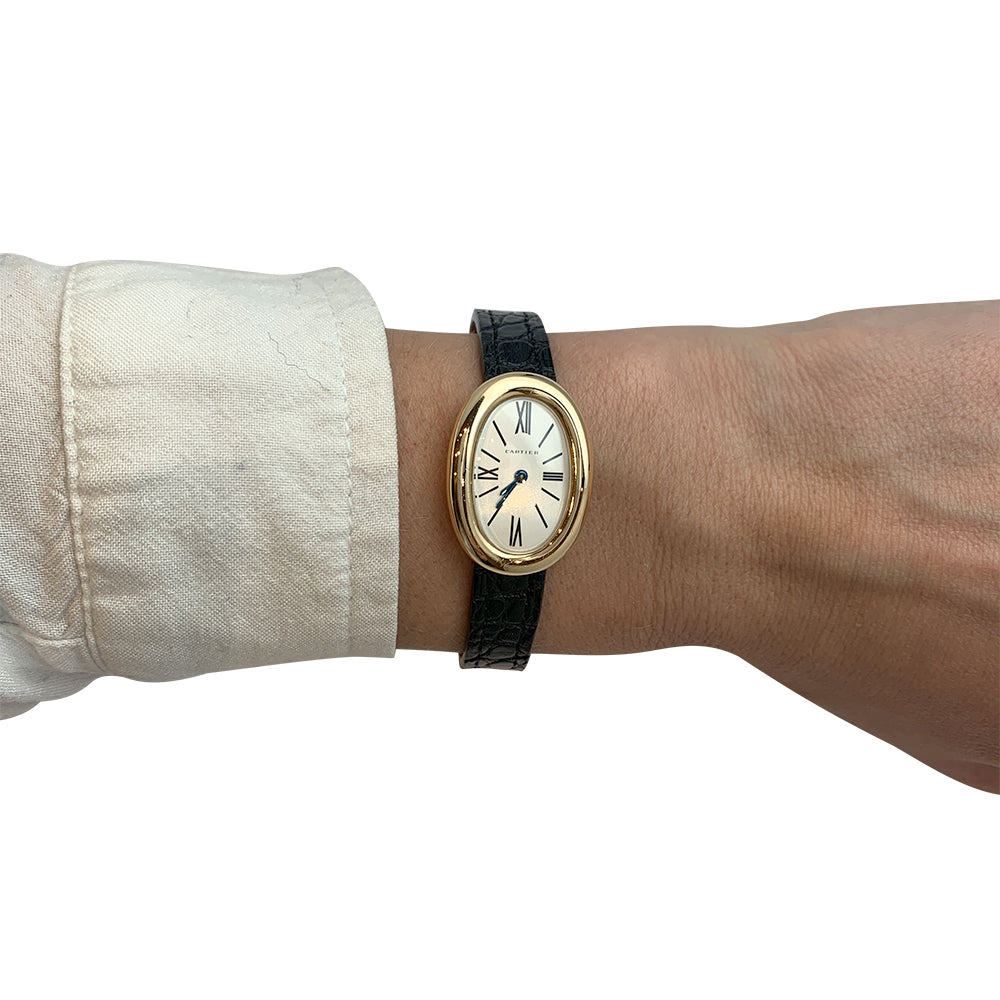 Cartier watch, "Baignoire" in yellow gold, leather strap.