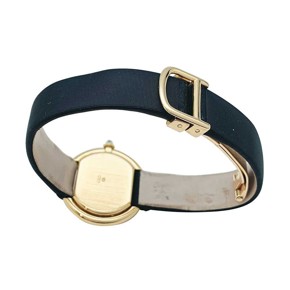 Cartier "Ellipse" watch in yellow gold.