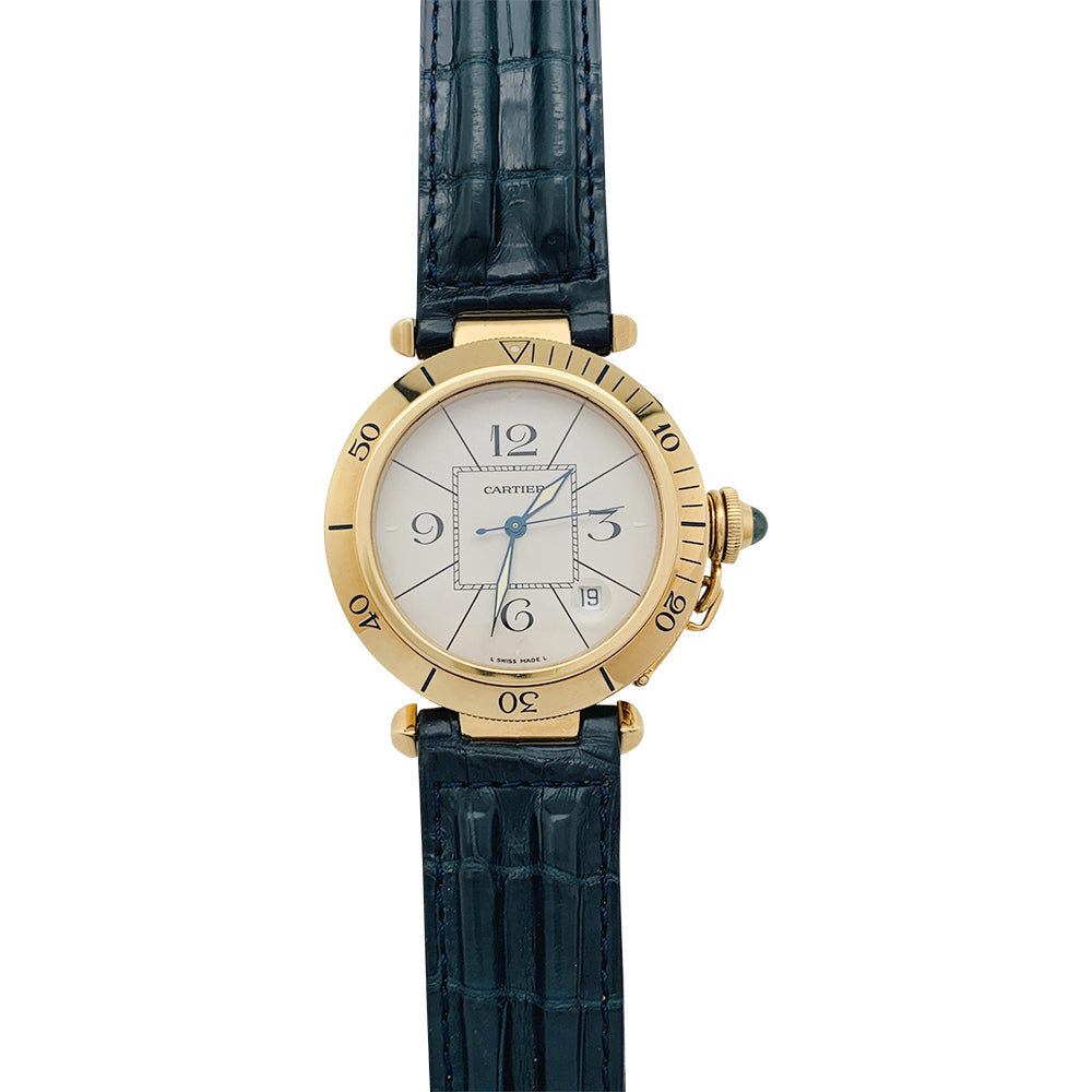 Cartier "Pasha" watch in yellow gold, leather.