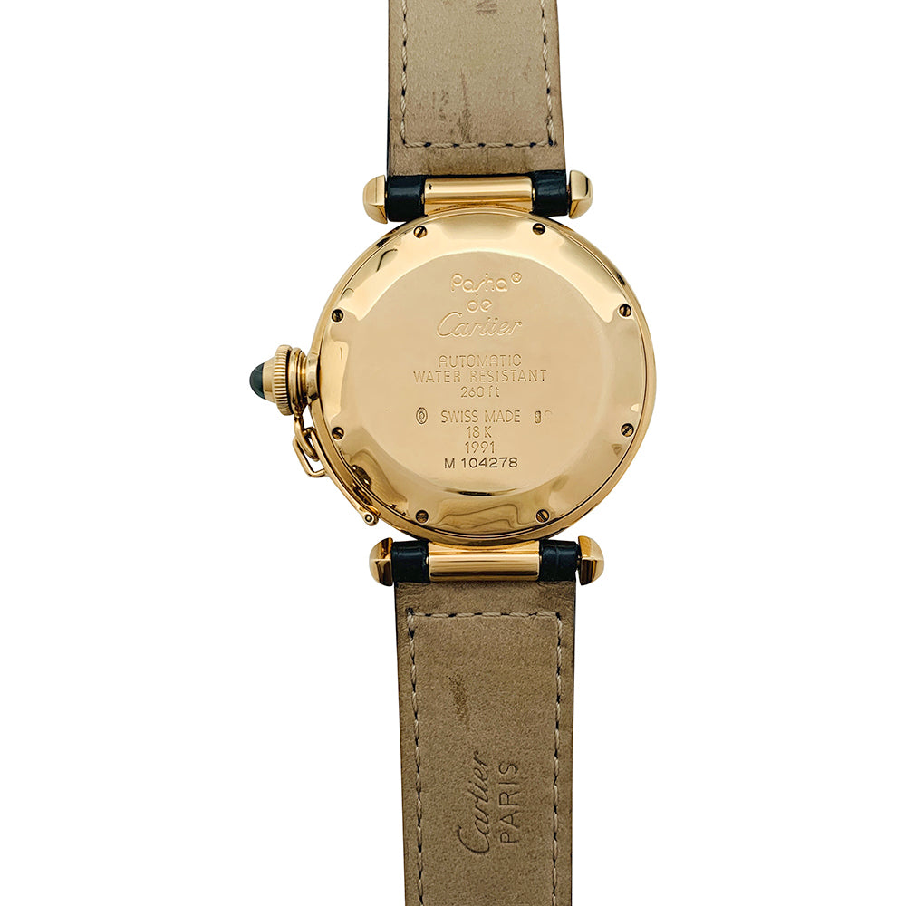 Cartier "Pasha" watch in yellow gold, leather.