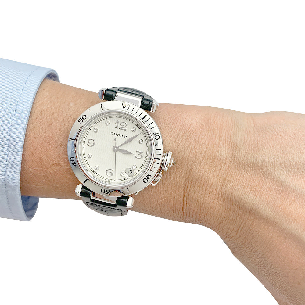 Cartier watch, "Pasha", white gold, diamonds and leather.