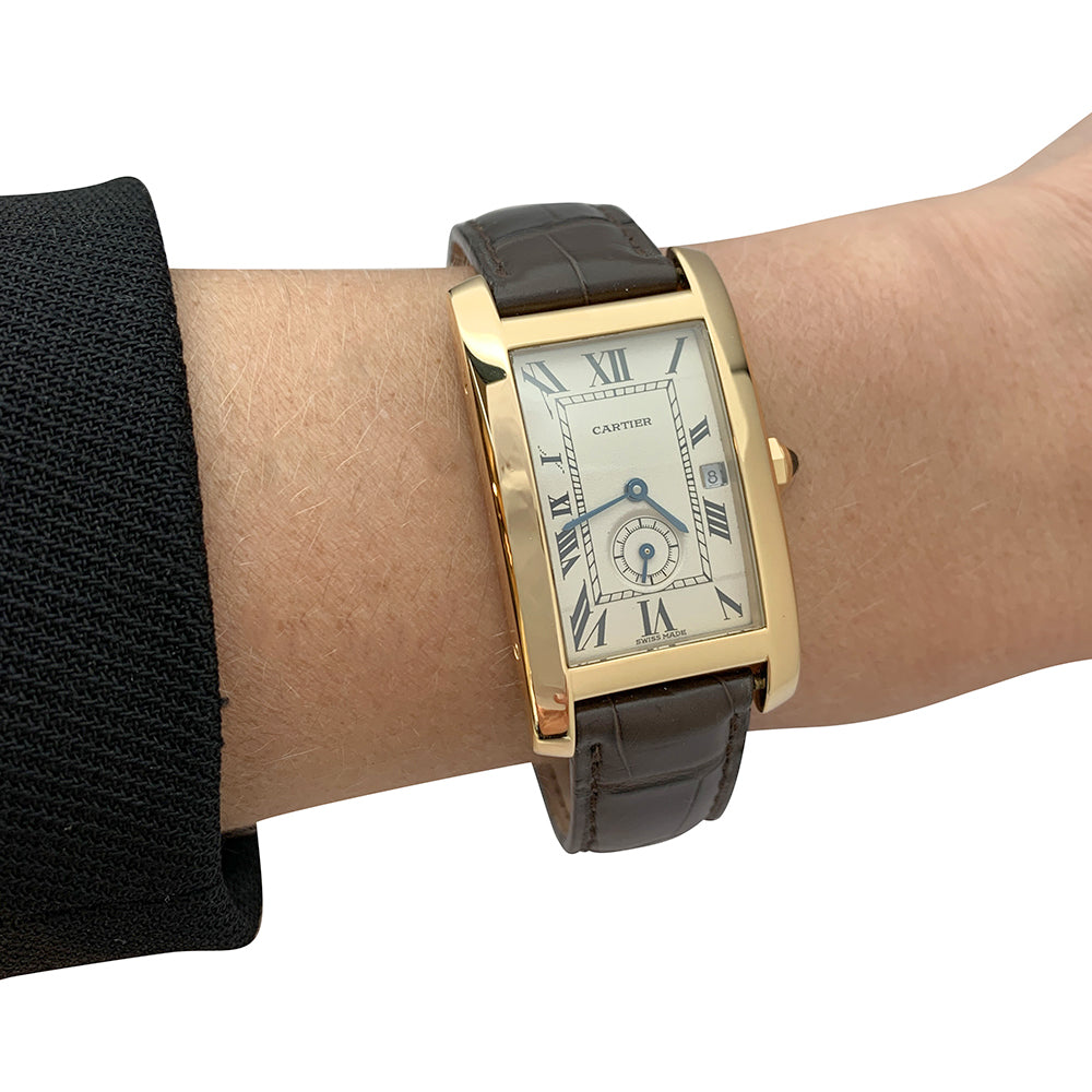 Cartier "Tank Américaine" watch in yellow gold on leather.