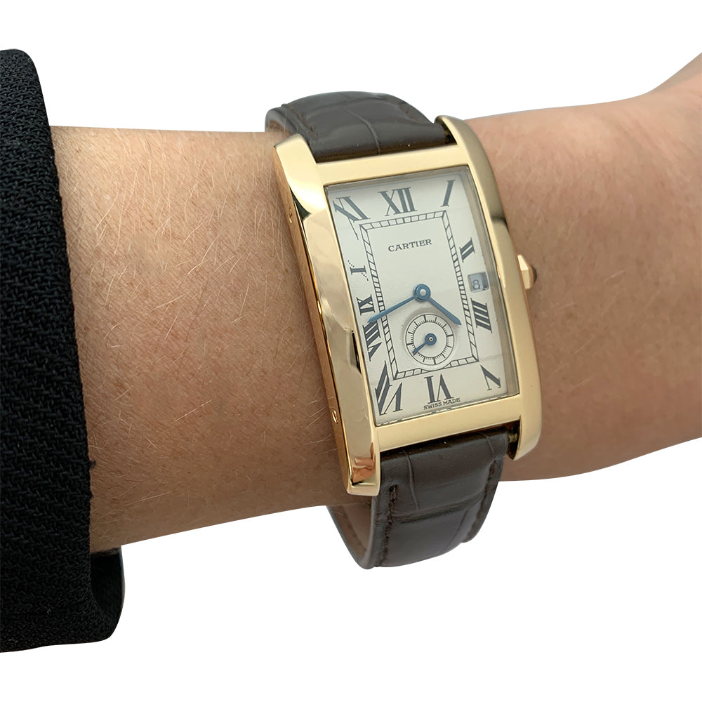 Cartier "Tank Américaine" watch in yellow gold on leather.