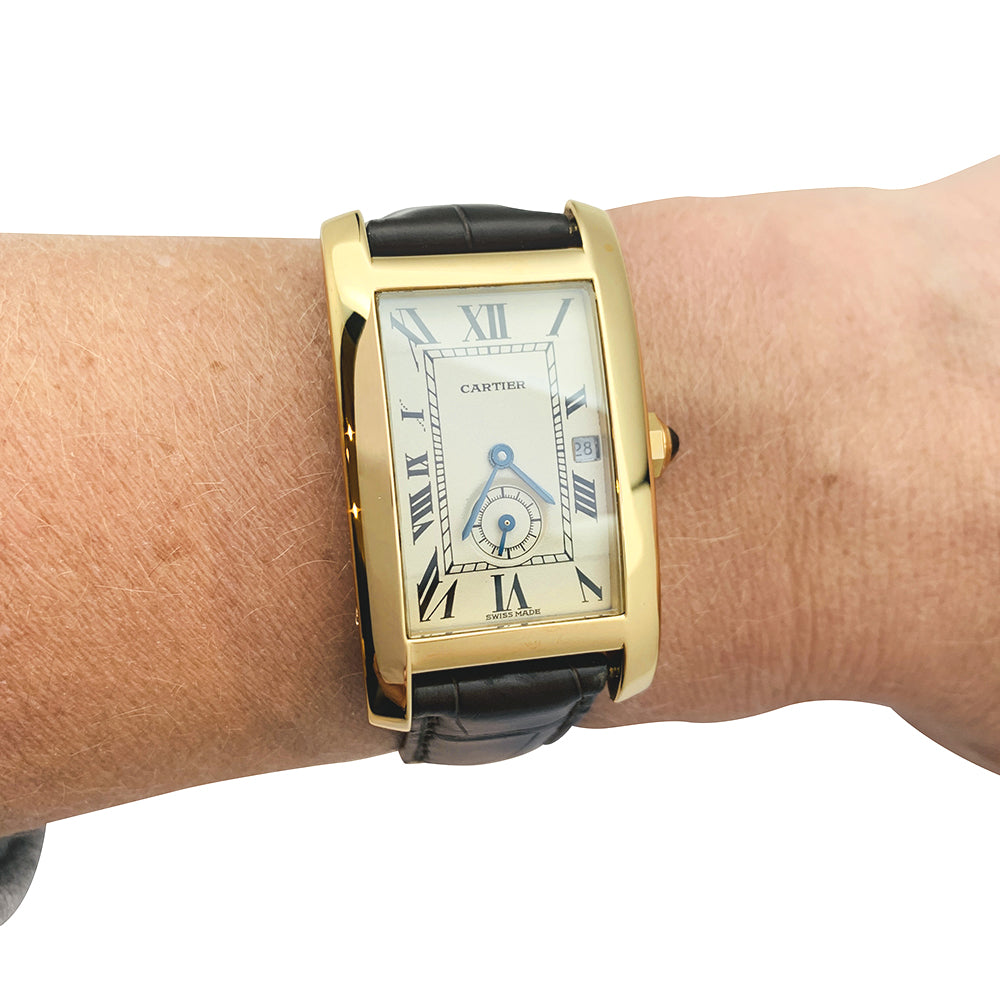 Cartier "Tank Américaine" watch in yellow gold on leather.