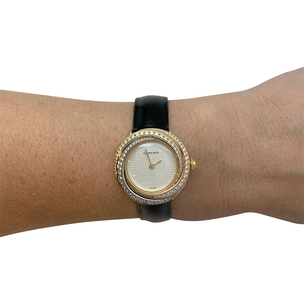 Cartier "Trinity" watch, 3 golds, diamonds, leather.