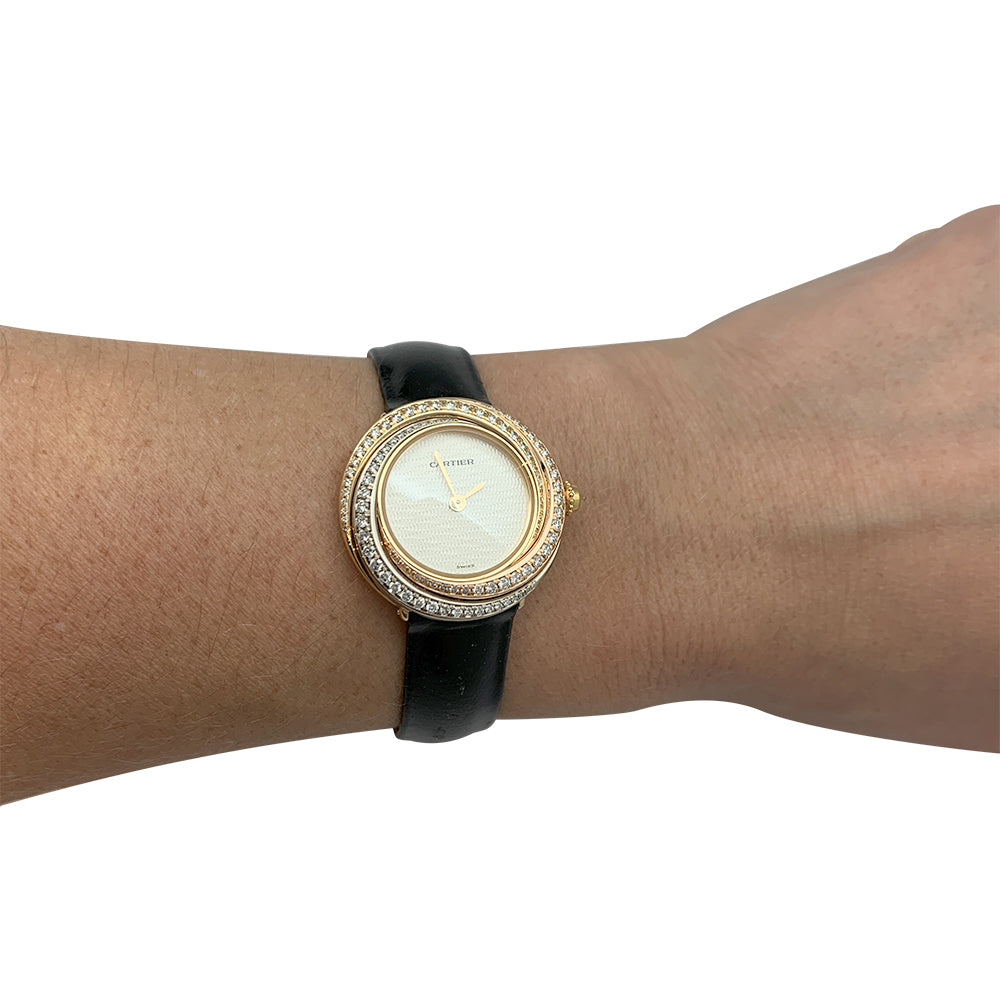 Cartier "Trinity" watch, 3 golds, diamonds, leather.