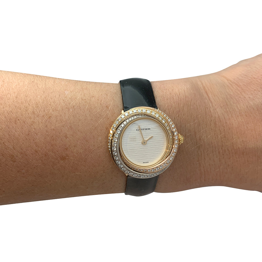 Cartier "Trinity" watch, 3 golds, diamonds, leather.