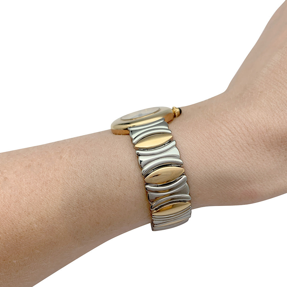 Cartier watch, "Colisée", yellow gold, steel.