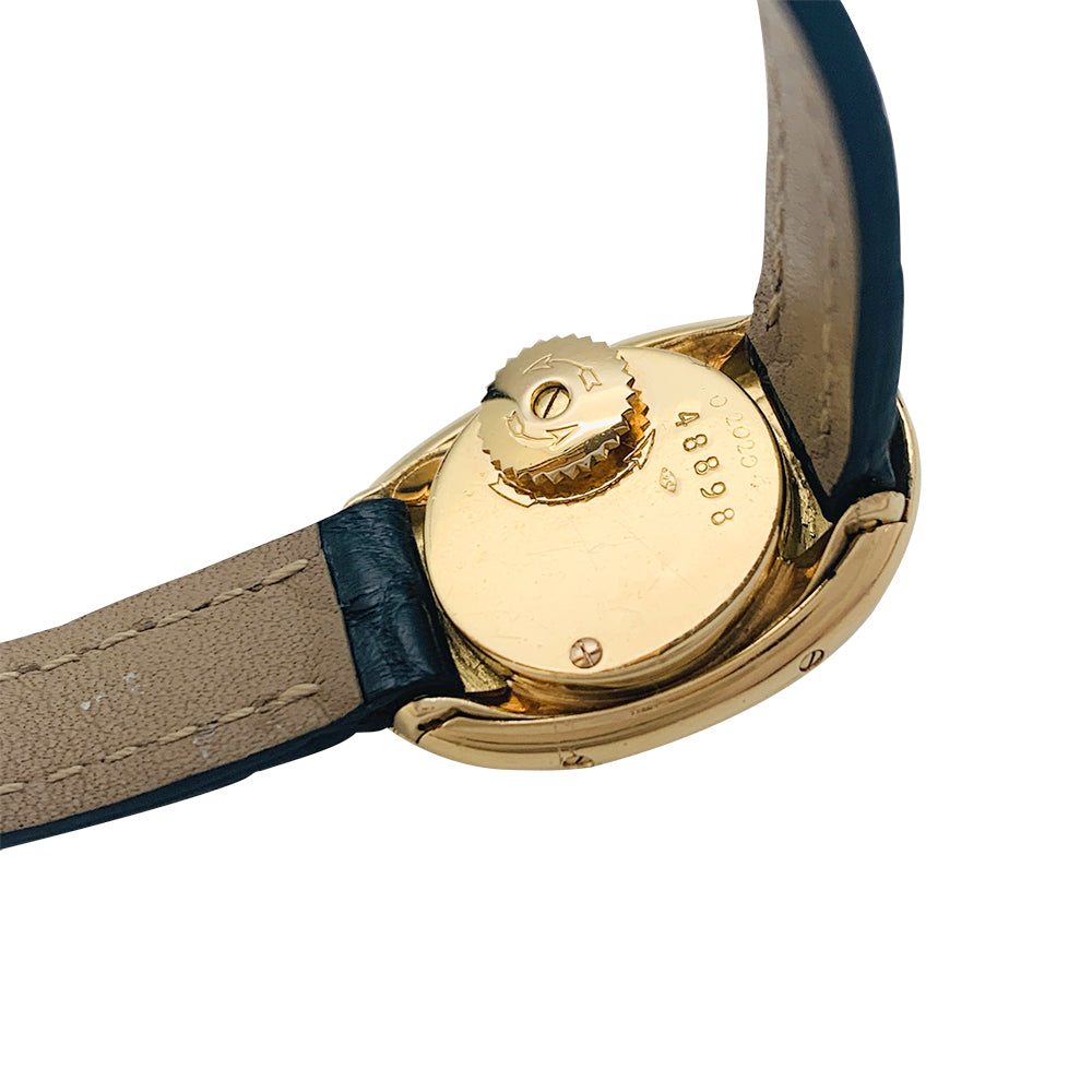 Cartier watch, "Baignoire" in yellow gold, leather strap.