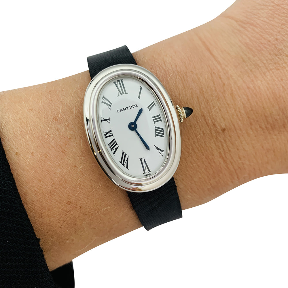 Cartier "Baignoire" model watch in white gold on leather.