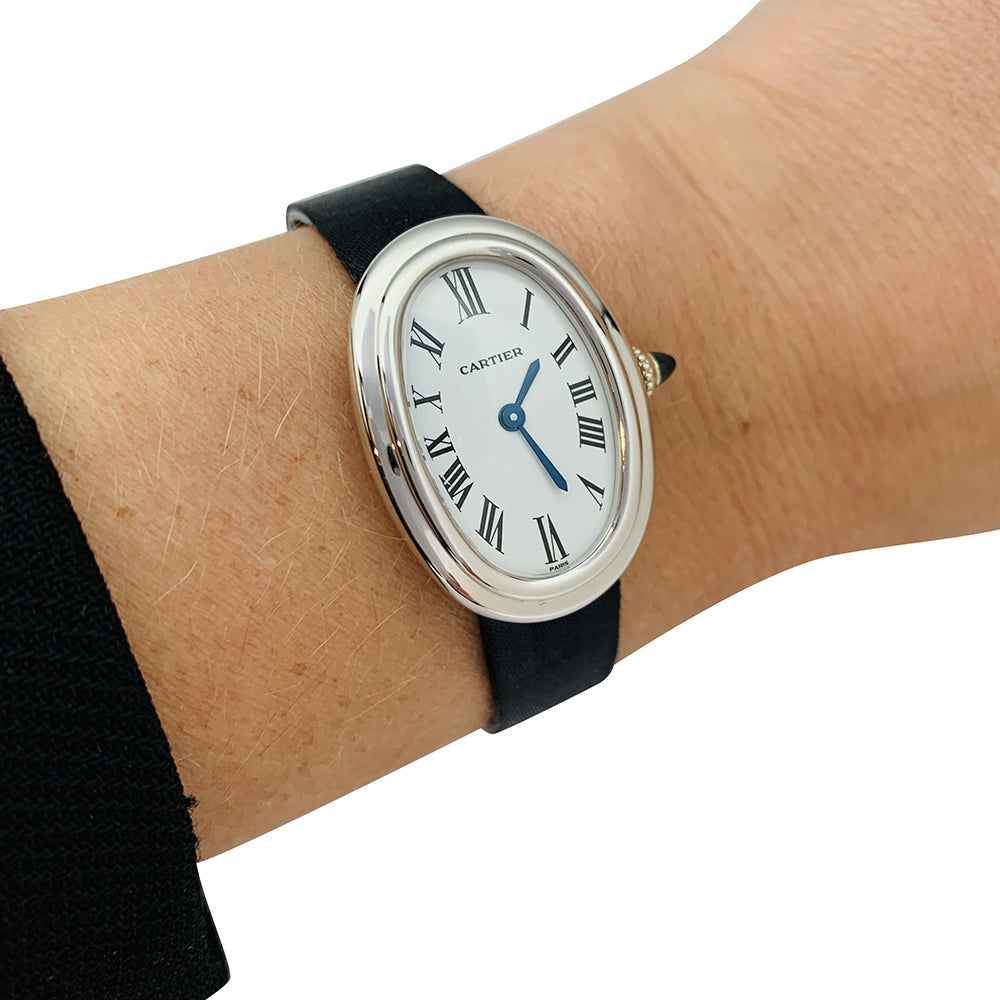 Cartier "Baignoire" model watch in white gold on leather.
