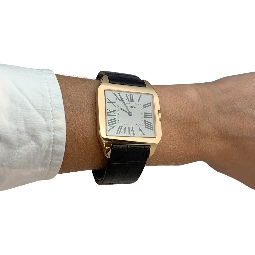 Cartier watch, "Santos Dumont" model, in pink gold on leather.