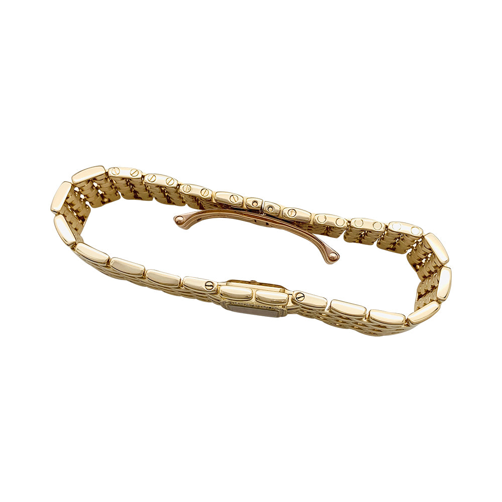 Cartier "Panthère Ruban" watch in yellow gold and diamonds.