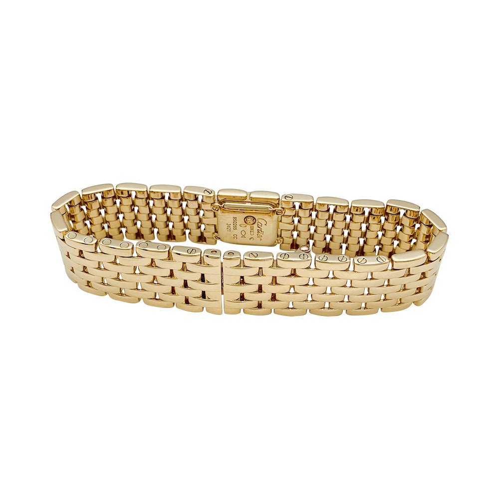 Cartier "Panthère Ruban" watch in yellow gold and diamonds.
