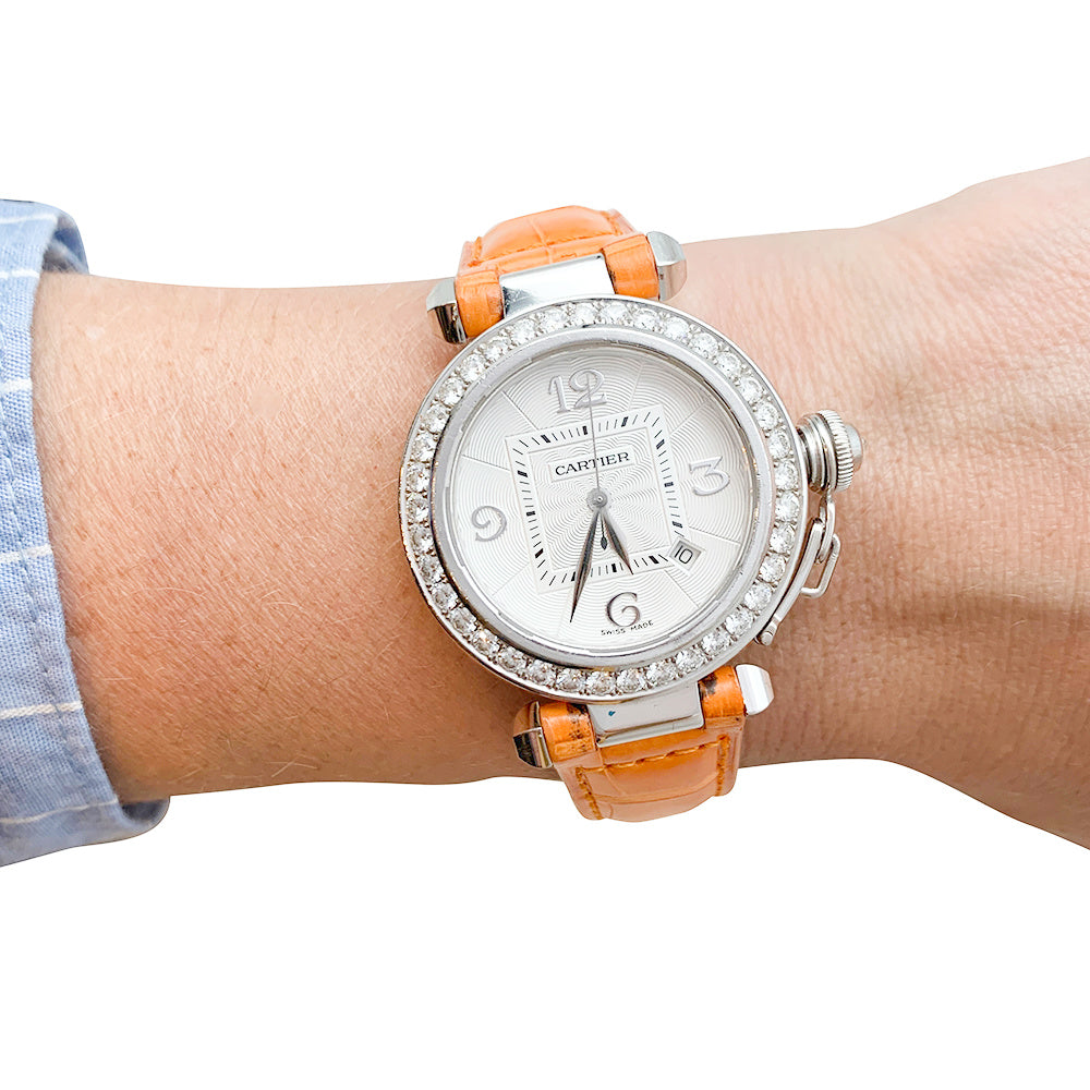 Cartier "Pasha" watch in white gold, diamonds and leather.