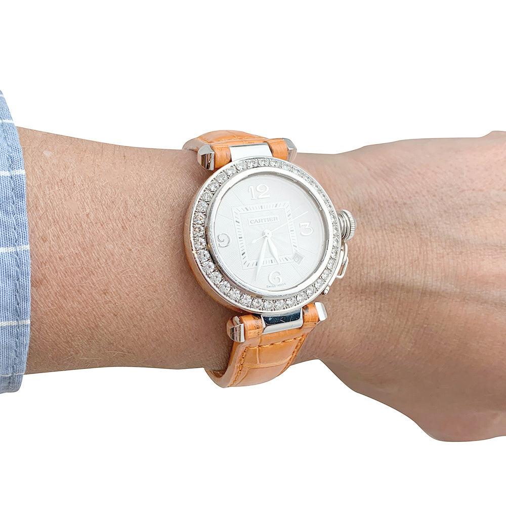 Cartier "Pasha" watch in white gold, diamonds and leather.